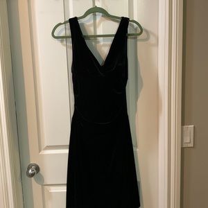 Flattering black velvet dress  deep vee Slight rouching and subtle flare